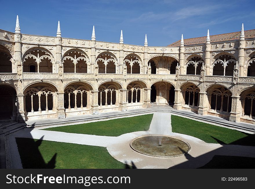 The cloistered courtyard at jeronimos monastery in lisbon portugal. The cloistered courtyard at jeronimos monastery in lisbon portugal