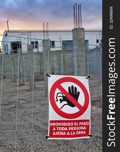 Restricted access poster in a building site of Spain