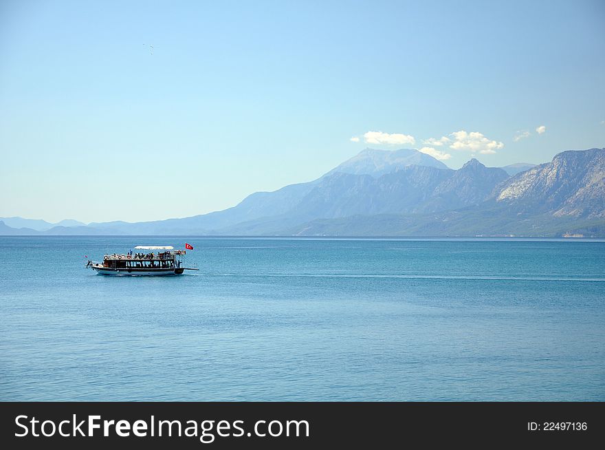 A local cruise boat crossing the bay at antalya in turkey. A local cruise boat crossing the bay at antalya in turkey