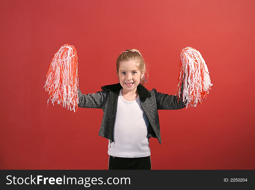 Shot of a cheerleader child center