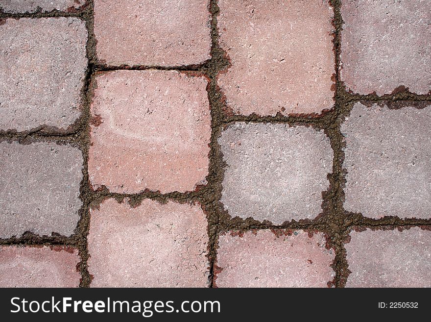 Texture of paving - stone tile pattern with wet cement after the rain. Texture of paving - stone tile pattern with wet cement after the rain.