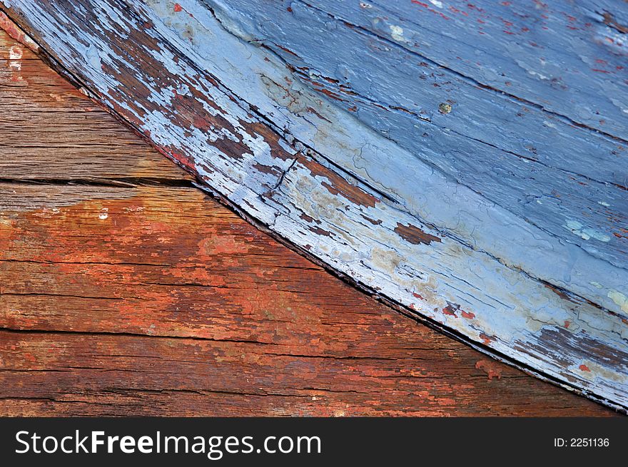 Interesting texture and colors from bottom of old wooden boat. Interesting texture and colors from bottom of old wooden boat.