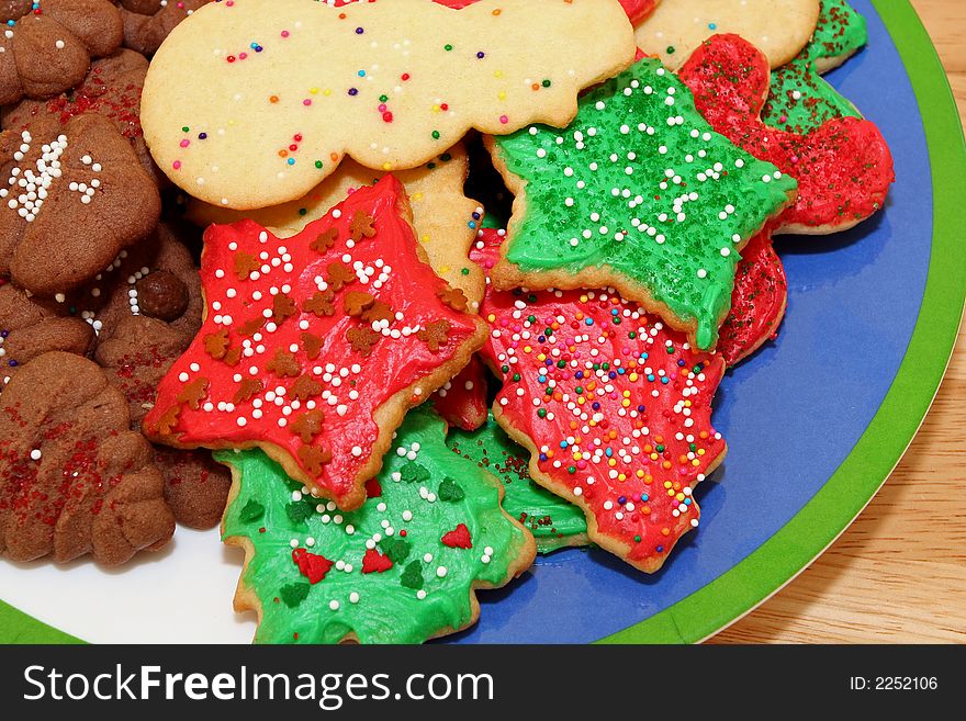 Red, green, and white Christmas cookies with sprinkles in a pile. Red, green, and white Christmas cookies with sprinkles in a pile.