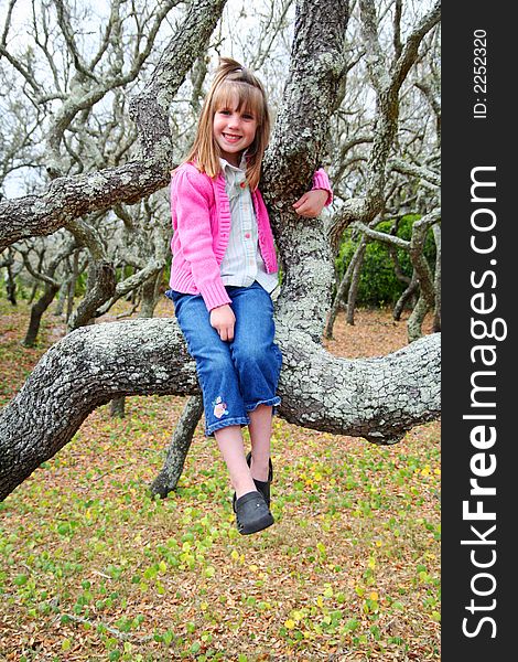 Girl in a mangrove tree