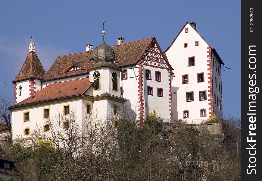 German castle and church in bright sunlight. German castle and church in bright sunlight