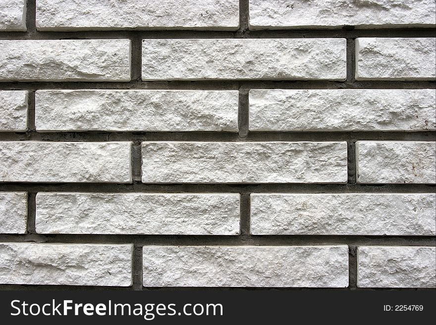 Closeup of a brick wall made of white bricks