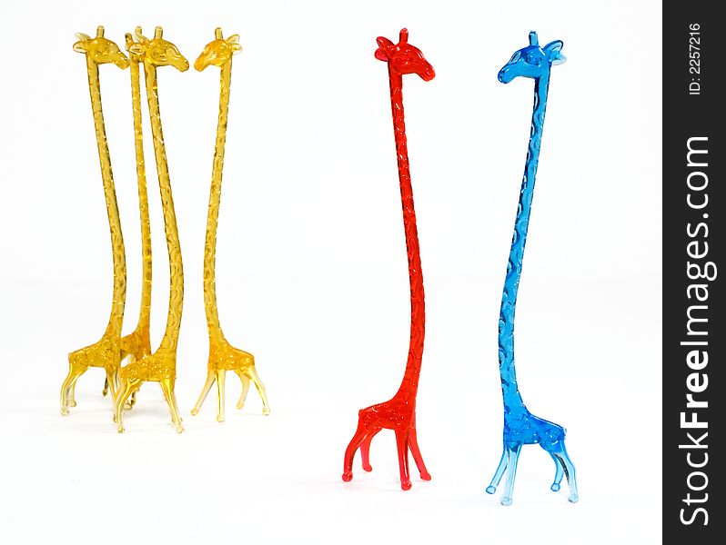 Set of glass colorful giraffes figurines. Set of glass colorful giraffes figurines