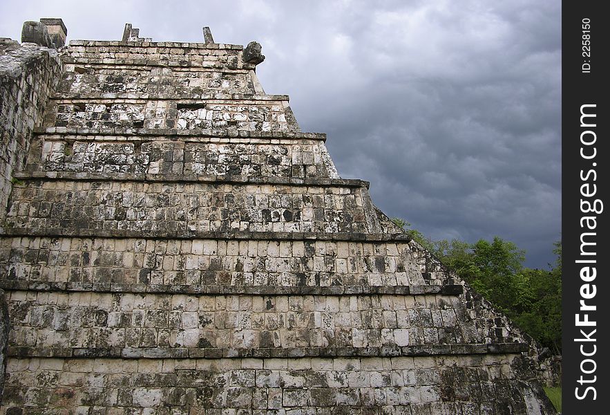 The side of a temple in Chichen Itza, Mexico. The side of a temple in Chichen Itza, Mexico.