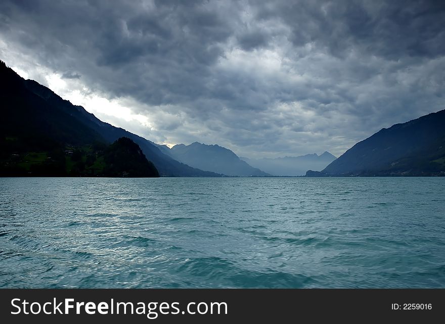 Brienzersee - one of two lakes next to Interlaken in bad weather undr dramatic sky