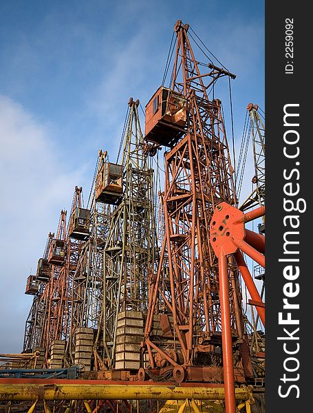 Cemetery of old elevating cranes