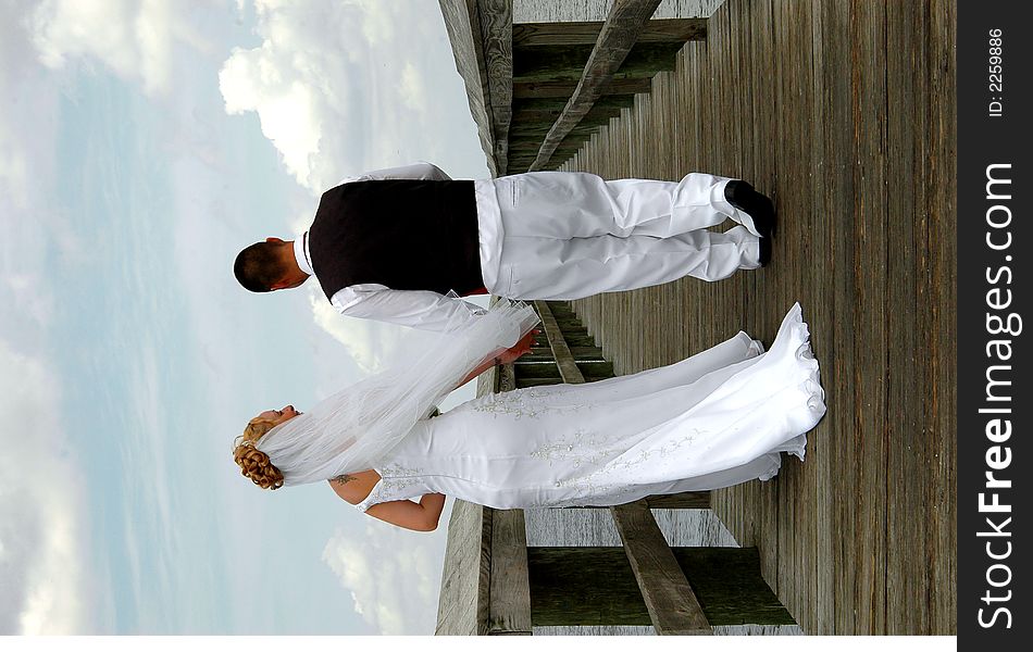 Bride And Groom On Boardwalk