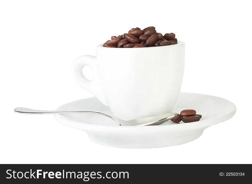 Pour coffee grounds into the cup is isolated on a white background