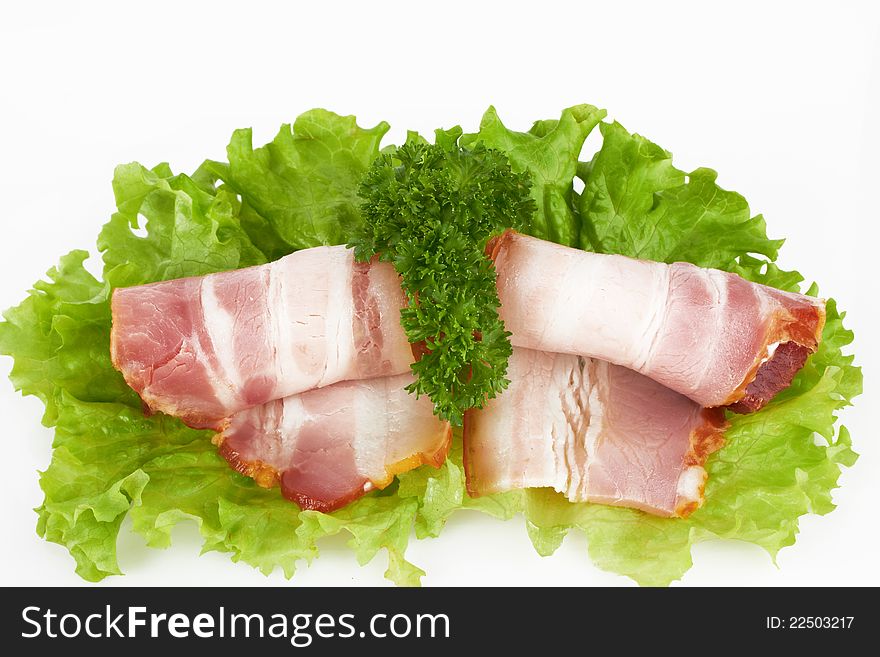 Sliced bacon on white background