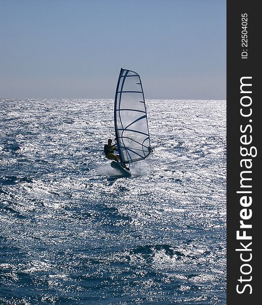 Windsurfing on the move - summer sport training. Windsurfing on the move - summer sport training