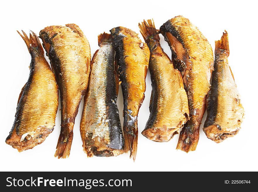 Smoked sprats in oil on white background