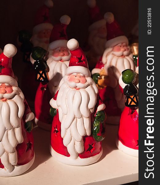 Santa Claus figurines for sale in a shop to Christmas