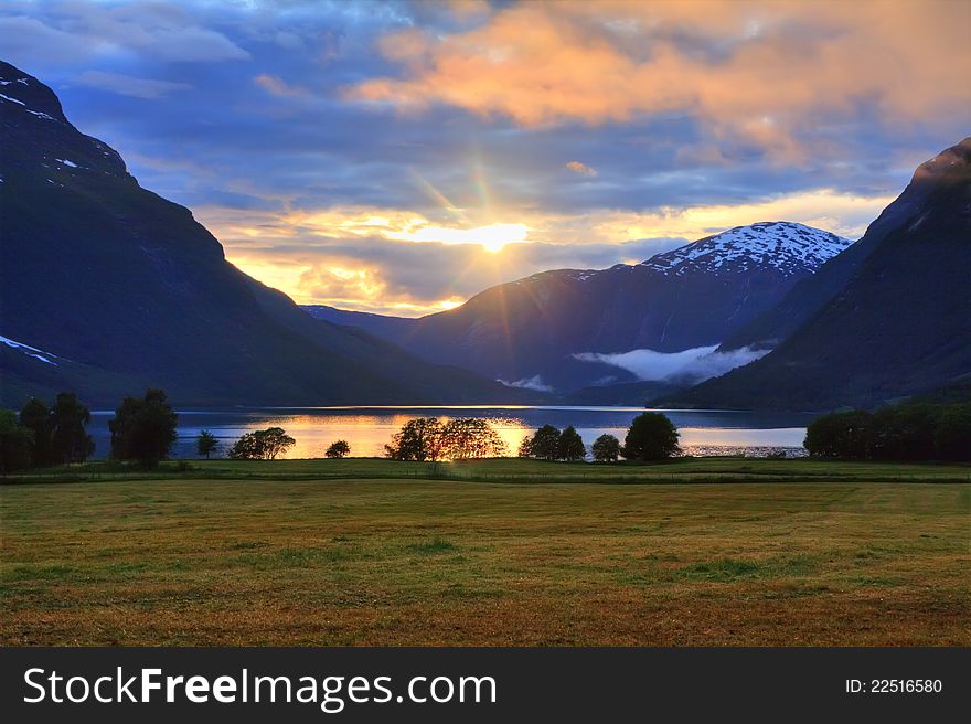 Beauyiful summer sunset near lake Lovatnet in Jostedalsbreen national park, Norway. Beauyiful summer sunset near lake Lovatnet in Jostedalsbreen national park, Norway