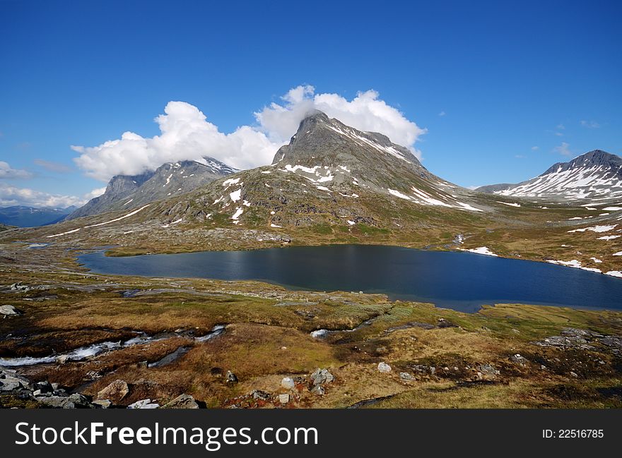 Beautiful mountain lake in Norway near Troll road