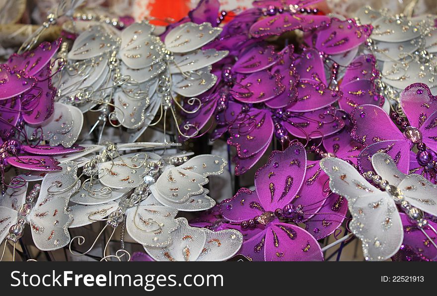 Decorative butterflies colored pink and silver