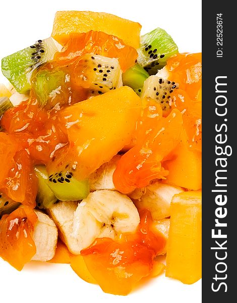 Heap of chopped tropical fruits on white