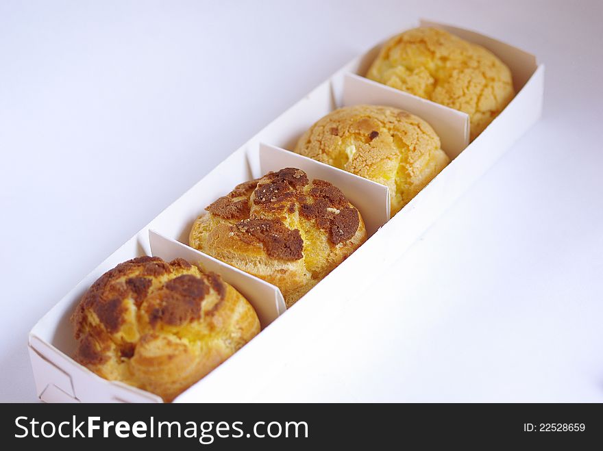 Four baked bread in a box