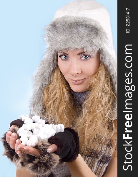 Woman In Winter Hat And Gloves With Snow