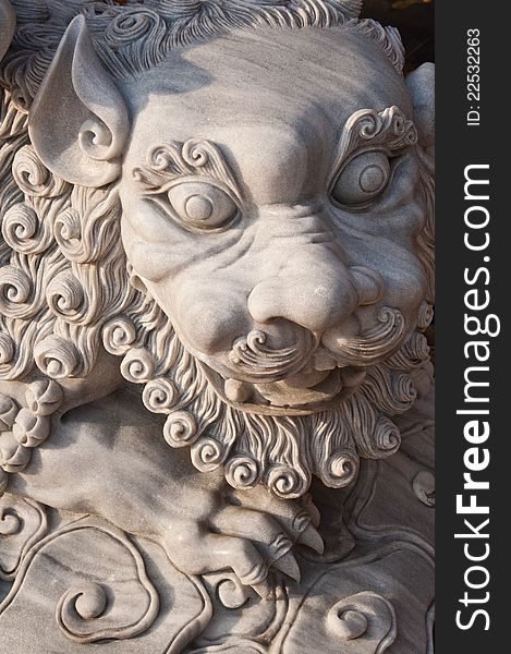 Ancient marble lion sculpture