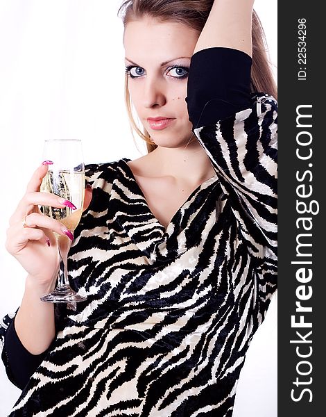 Girl with a glass of champagne isolated on a white background. Girl with a glass of champagne isolated on a white background.