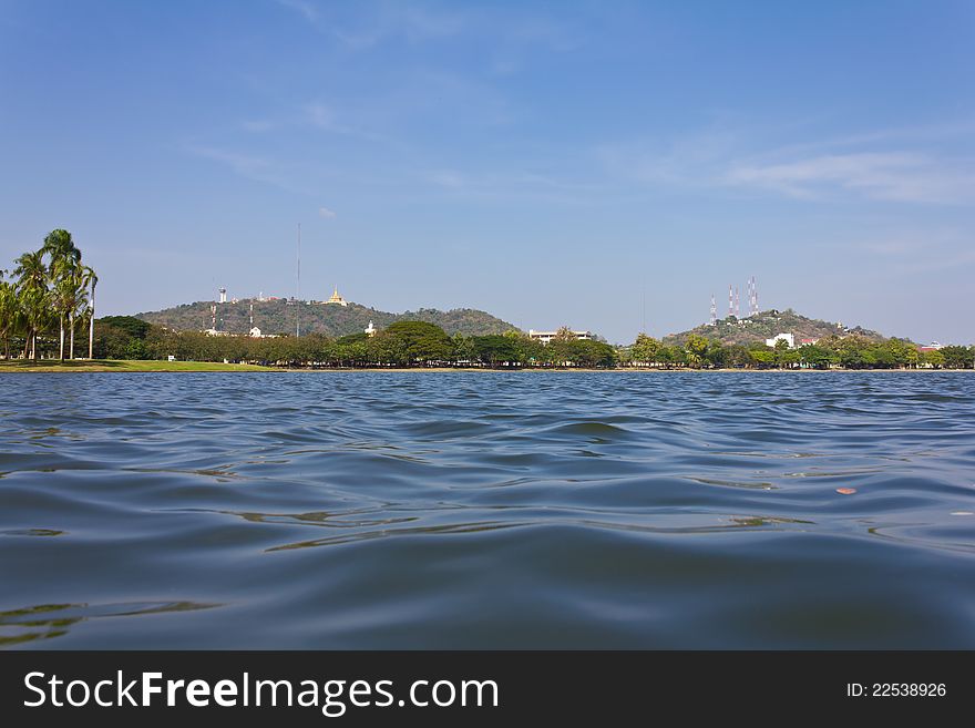 Temple on a hill looking over water in the Province of Thailand. Temple on a hill looking over water in the Province of Thailand.