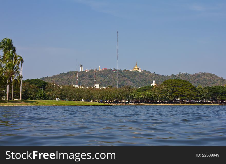 Temple on a hill looking over water in the Province of Thailand. Temple on a hill looking over water in the Province of Thailand.