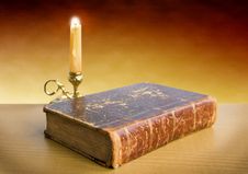 Candlestick And Old Book Royalty Free Stock Image Candlestick And Old Book Royalty Free Stock Image