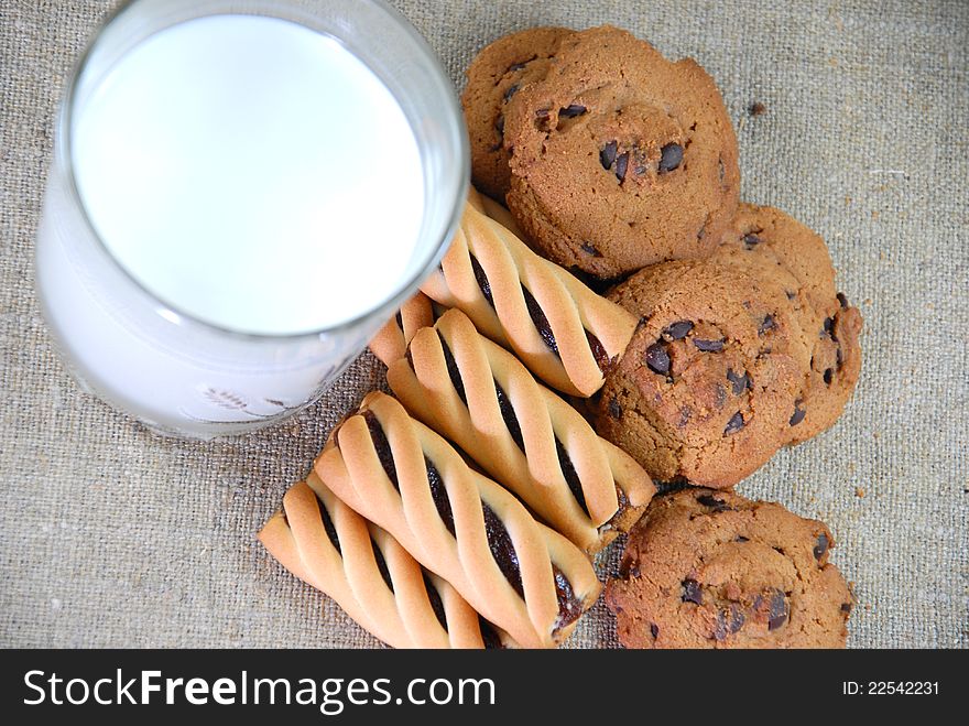 Milk And Cookies Of Different Flavors