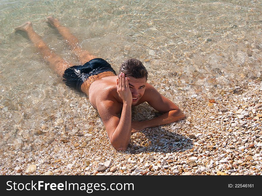 Beautiful Tanned Young Fellow In Sea Water