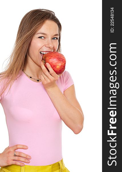 Young happy woman biitng apple