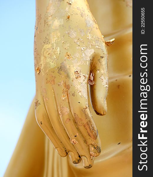 Golden Hand of the Buddha statue with some gold leaf