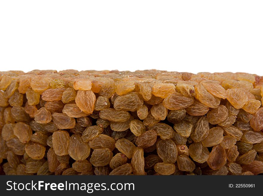 Pile of raisins or black currant isolated on a white background