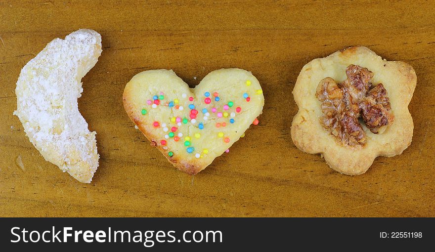 Choice of three home-baked german Christmas cookies in different shapes and tastes - called Vanillekipferl, ButterplÃ¤tzchen and WalnussplÃ¤tzchen. Choice of three home-baked german Christmas cookies in different shapes and tastes - called Vanillekipferl, ButterplÃ¤tzchen and WalnussplÃ¤tzchen