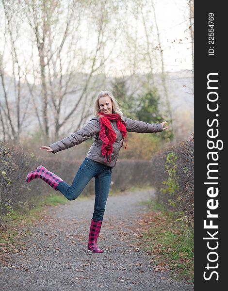 The girl on a walk in the autumn park