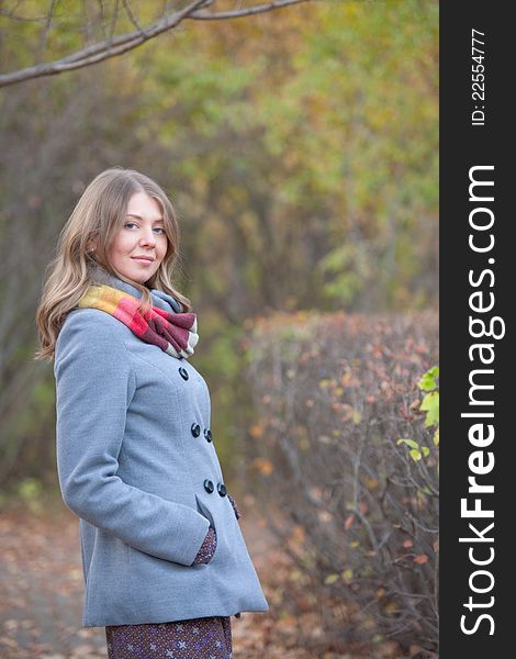 Girl On A Walk In The Autumn Park