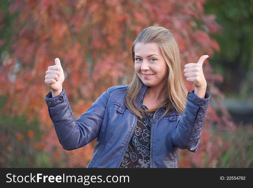 Pretty Positive Girl With Thumbs Up