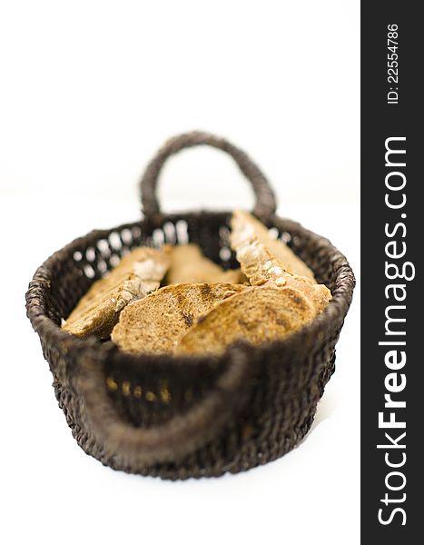 Toasted sliced of bread in brown basket. Toasted sliced of bread in brown basket