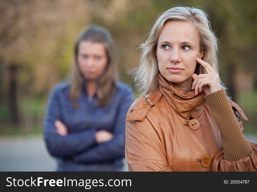 The girlfriend for a walk in the autumn park