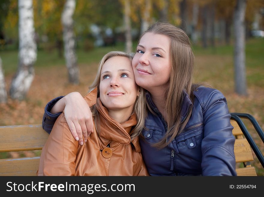 Girlfriend for a walk in the autumn park. Girlfriend for a walk in the autumn park