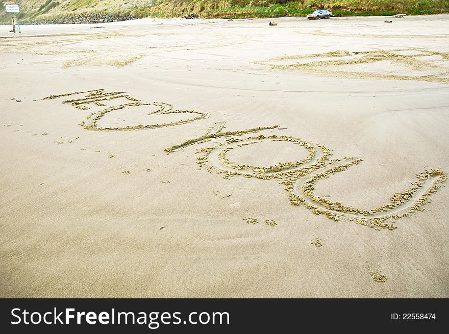 Me heart you written in scrawl into sand on a deserted beach.