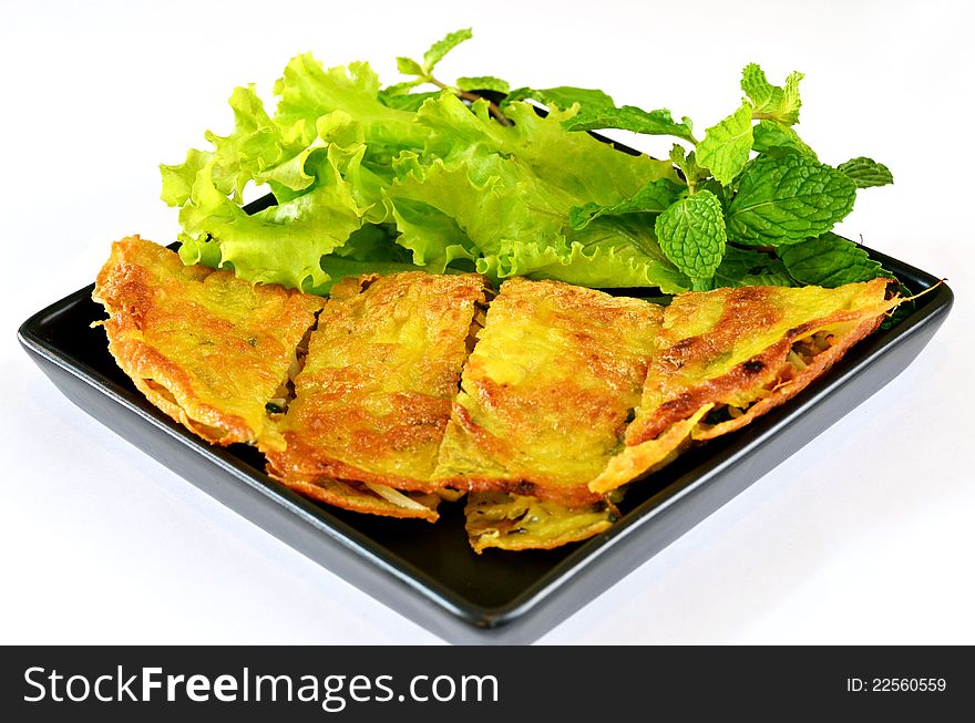 Vietnamese stuffed crispy omelette served with fresh vegetable. Vietnamese stuffed crispy omelette served with fresh vegetable