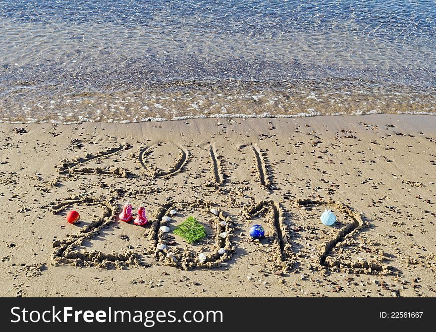 Message of 2012 New Year has came on the gold sandy beach of the Red Sea near Eilat. Message of 2012 New Year has came on the gold sandy beach of the Red Sea near Eilat