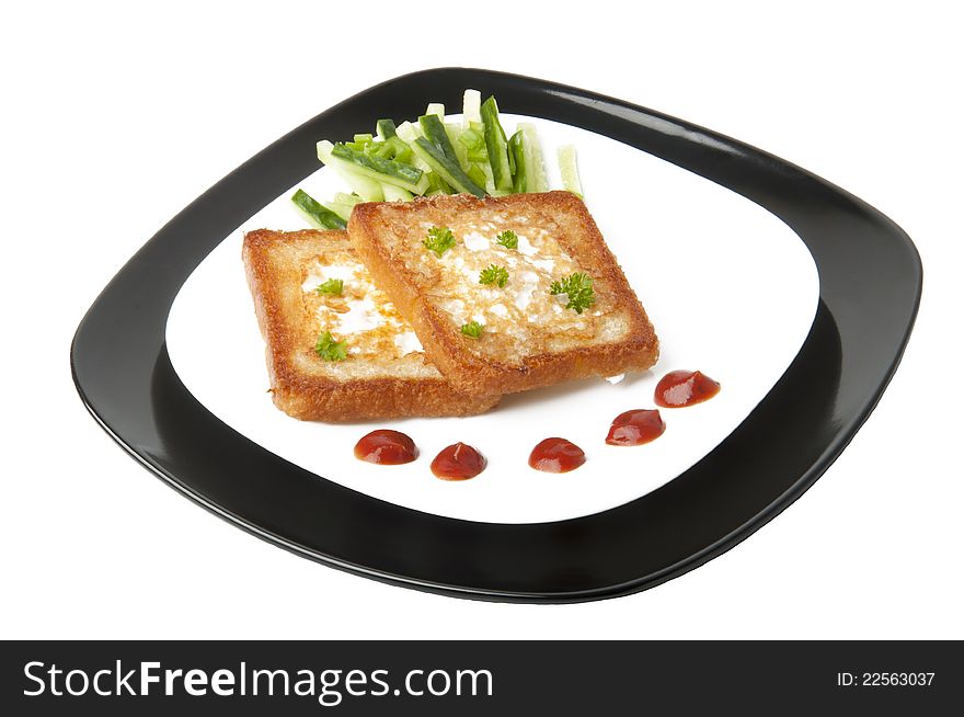 Toasted white bread with an egg on a plate