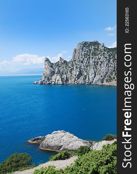 Karaul-Oba is a famous guard mountain on the Crimean coast. This headland together with cape Kapchik have formed the Blue bay of Novij Svet. Karaul-Oba is a famous guard mountain on the Crimean coast. This headland together with cape Kapchik have formed the Blue bay of Novij Svet.