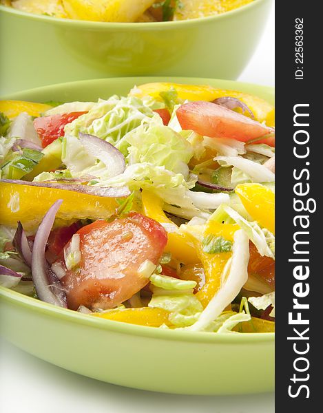 A delicious salad and boiled potatoes on a white background