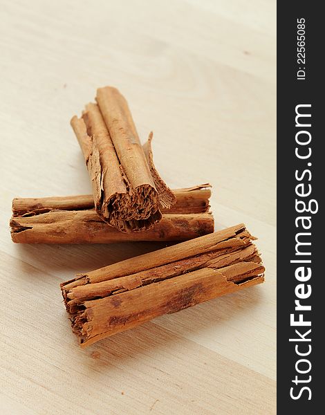 Cinnamon rolls on a wooden surface